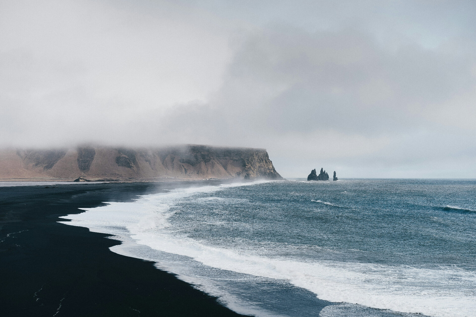 Reynisfjara black sand beach and sea stacks on Iceland's South Coast